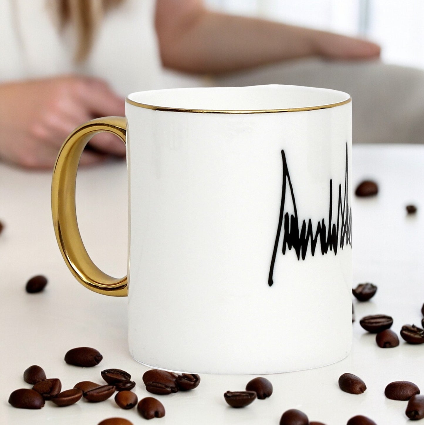 The ultimate Luxury Trump Signature Mug! A genuine Bone China Mug, featuring a gold handle and rim. (11 Oz)